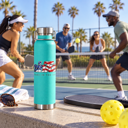 minTusa Star Spangled mint-green insulated bottle at a Southern California outdoor pickleball court