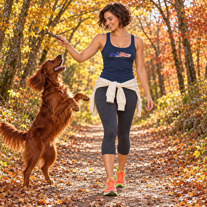 Woman wearing the navy minTusa Star Spangled micro-rib tank with charcoal capri leggings, playing with an Irish setter on an autumn path